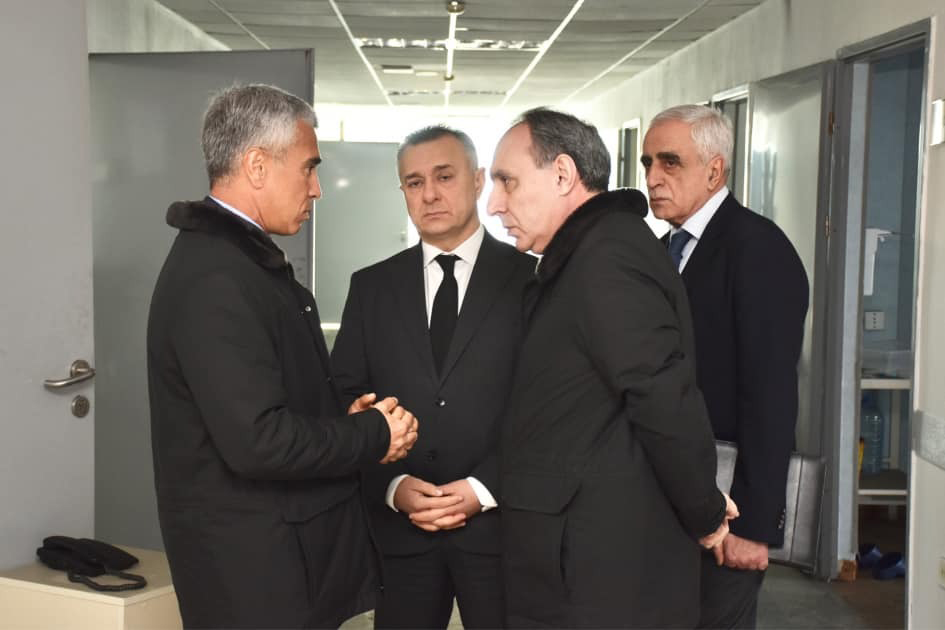 a group of men in suits