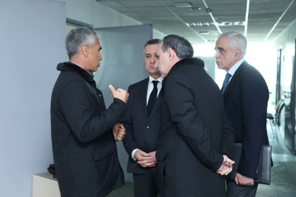 a group of men in suits