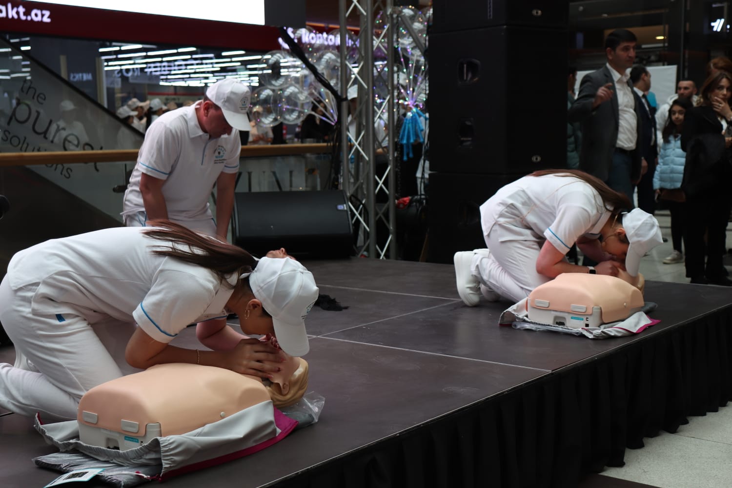 a man in a white uniform doing a push up on a table