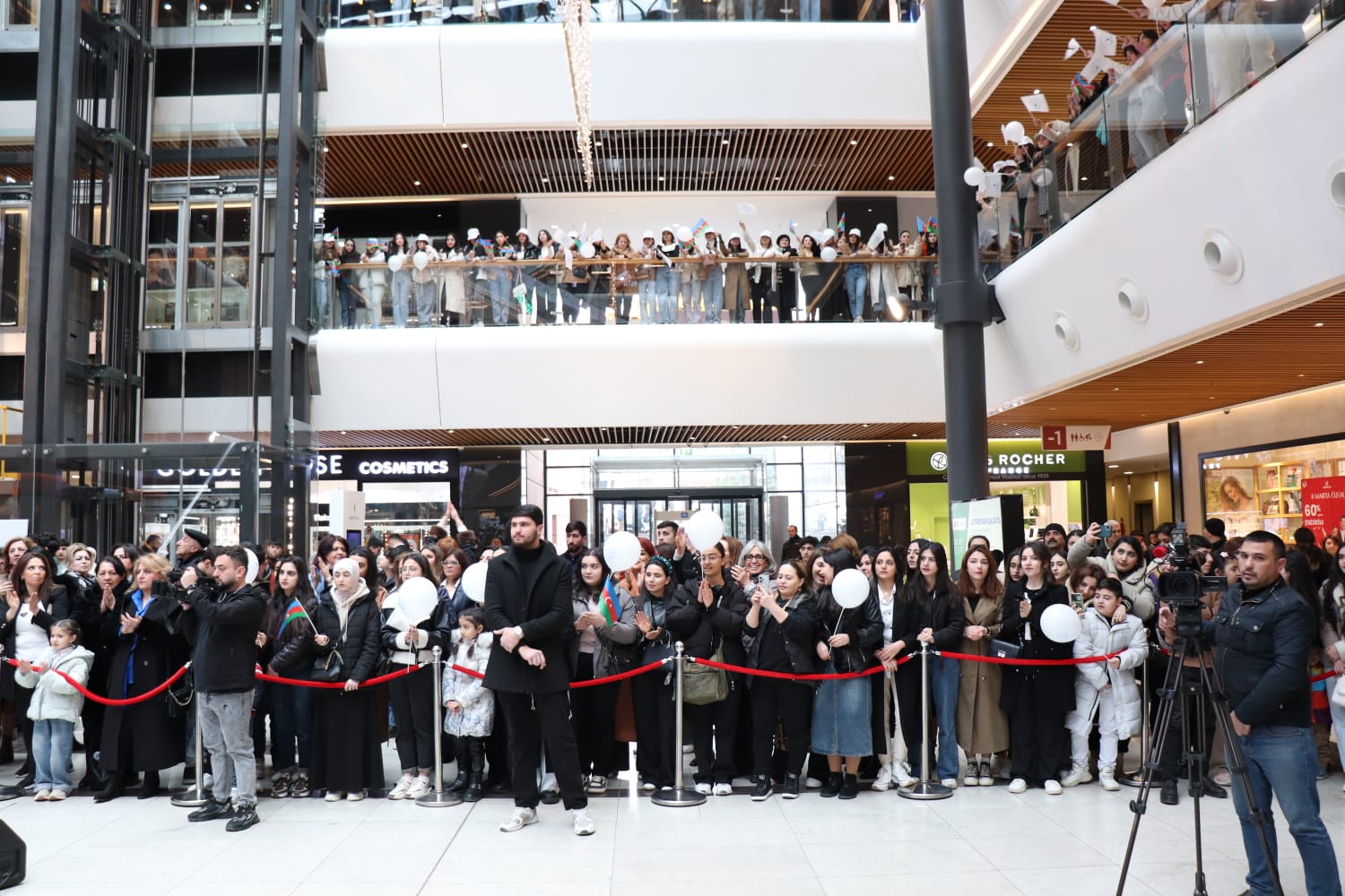 a group of people standing outside a building