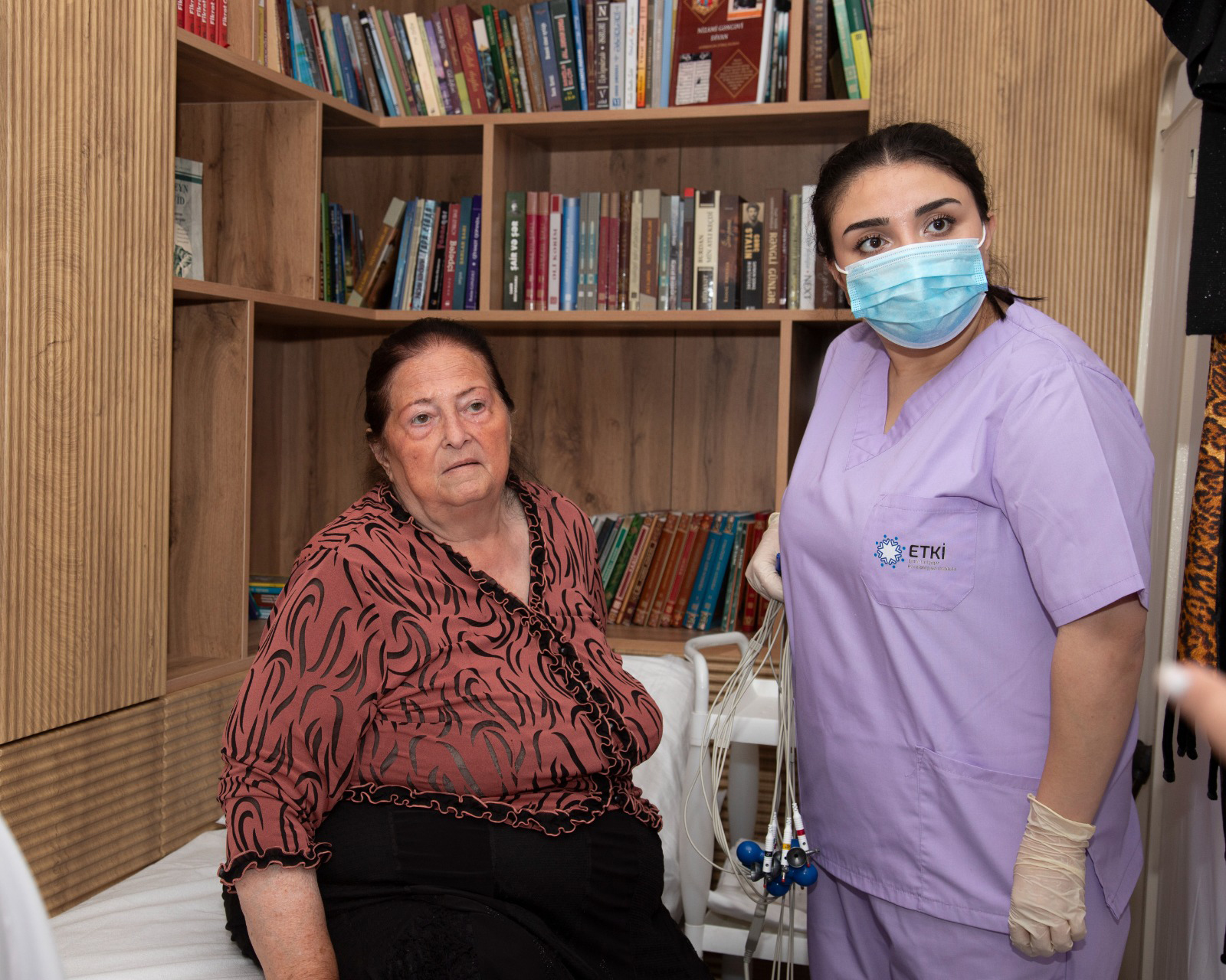 a man and woman wearing masks