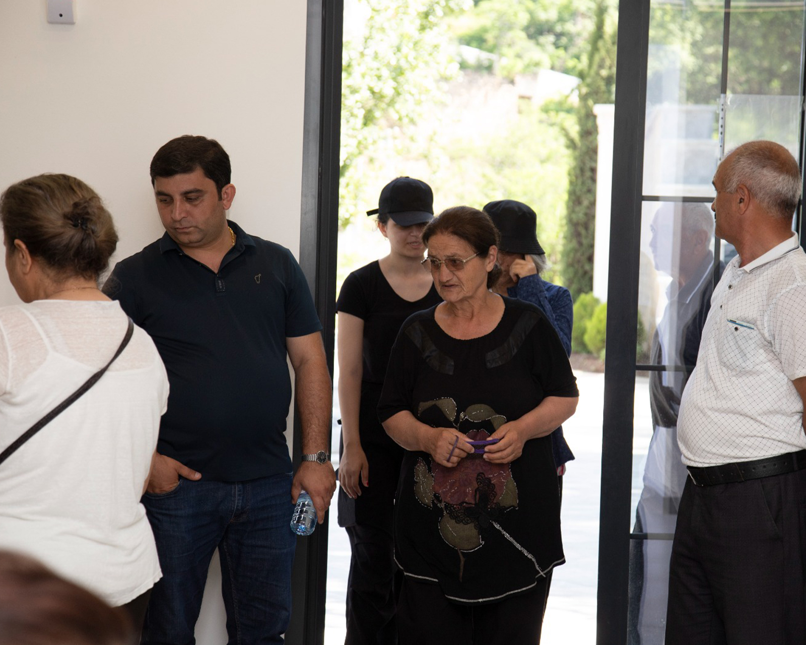 a group of people standing outside