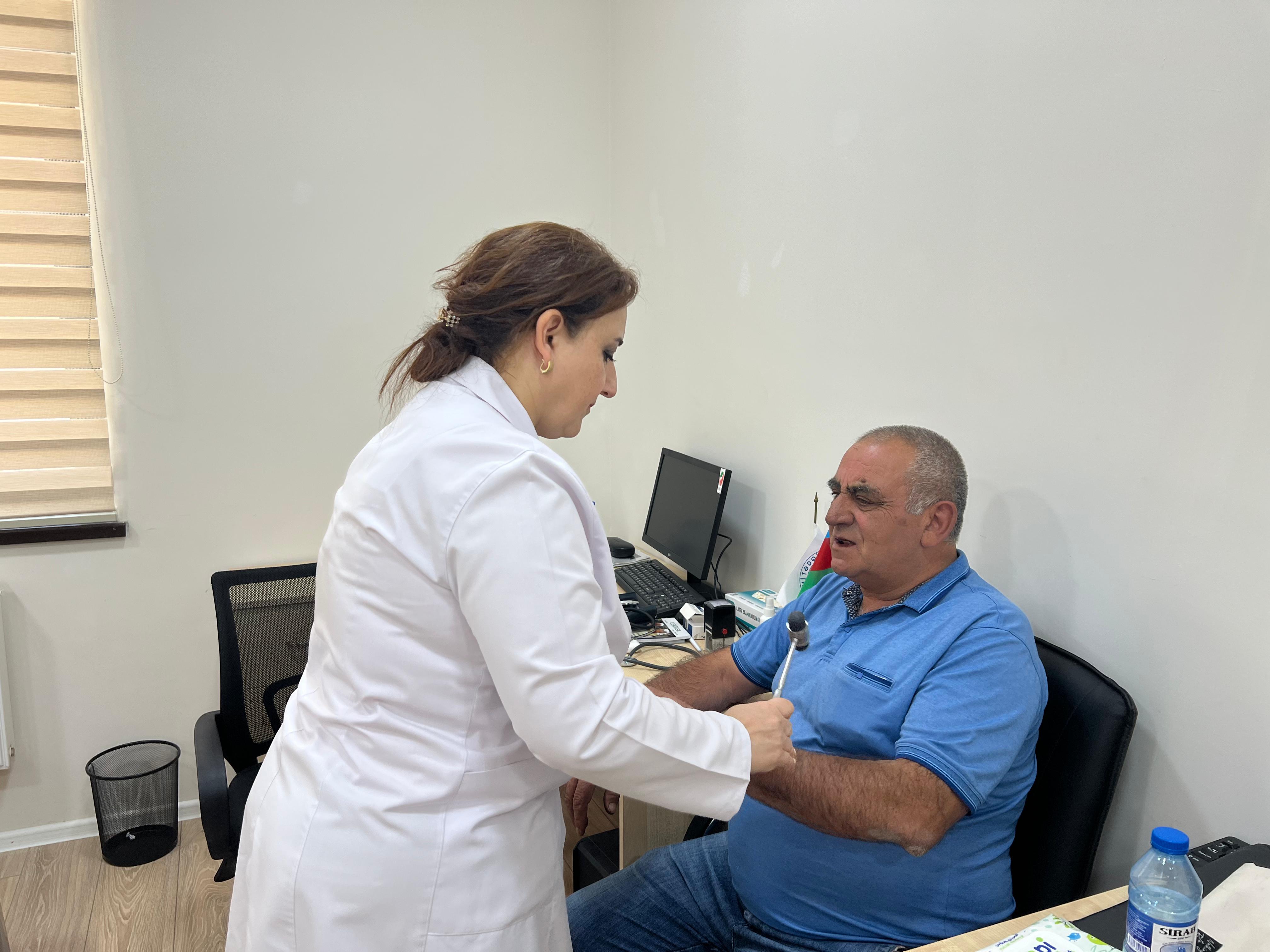 a doctor talking to a patient