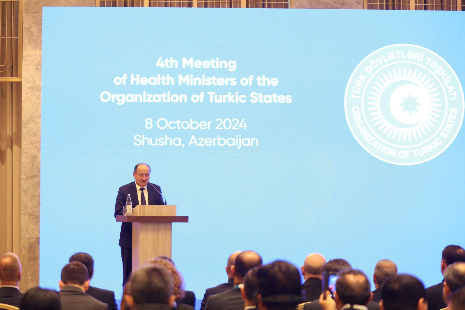 A speaker addresses an audience at the 4th Meeting of Health Ministers of the Organization of Turkic States in Shusha, Azerbaijan.