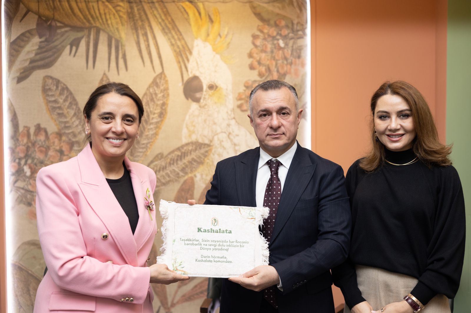 a group of people holding a certificate