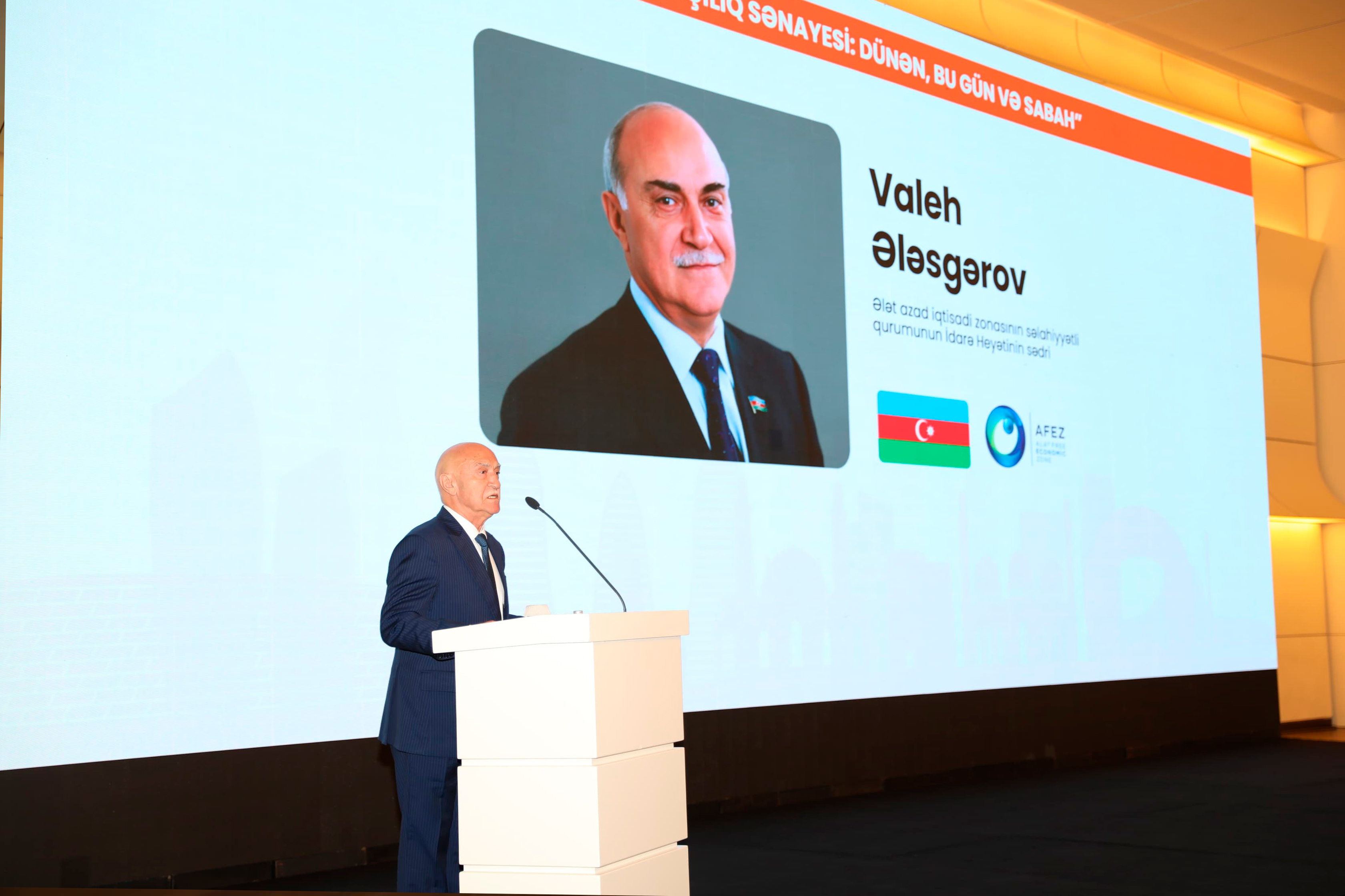 a man standing at a podium