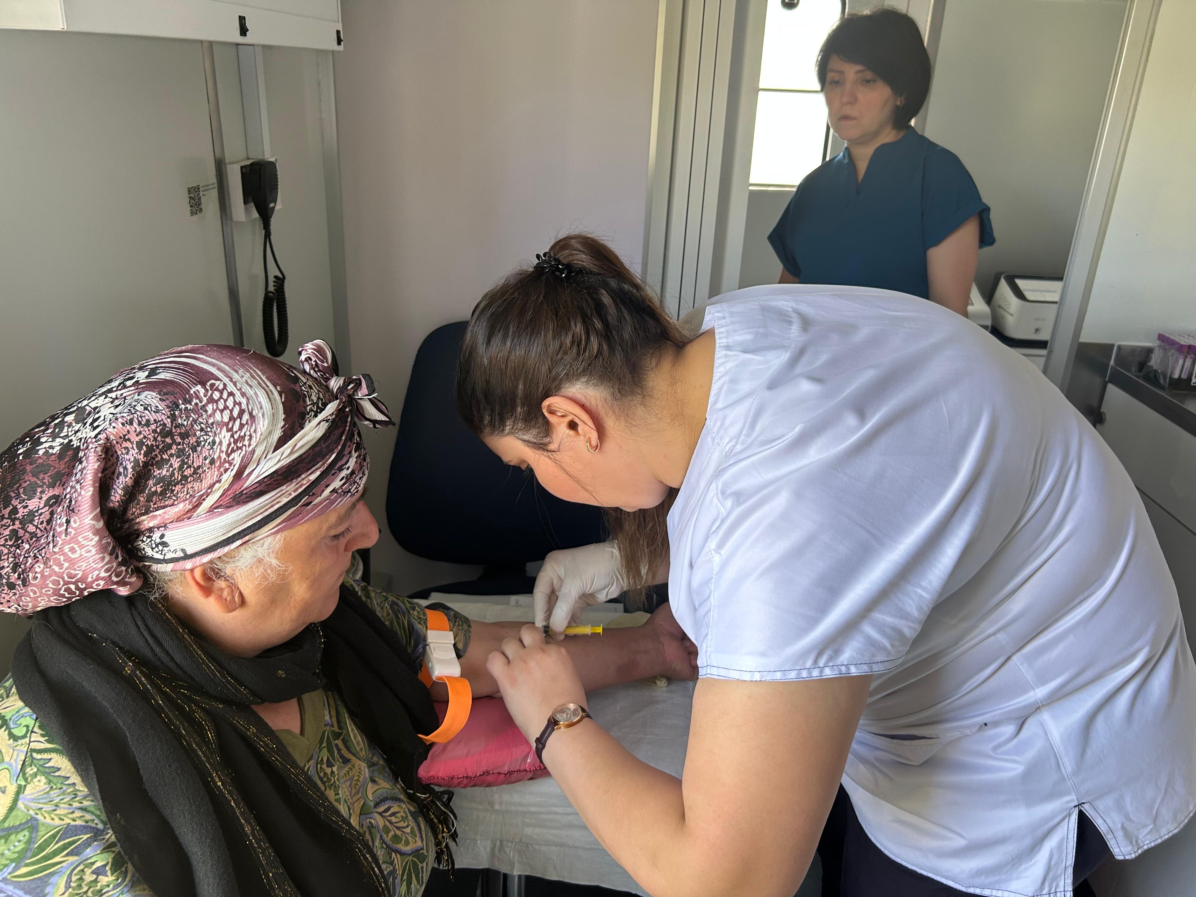 a man getting a blood pressure checked